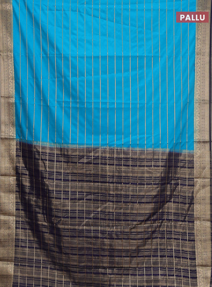 Semi mysore silk saree light blue and navy blue with allover zari woven stripes pattern and zari woven border