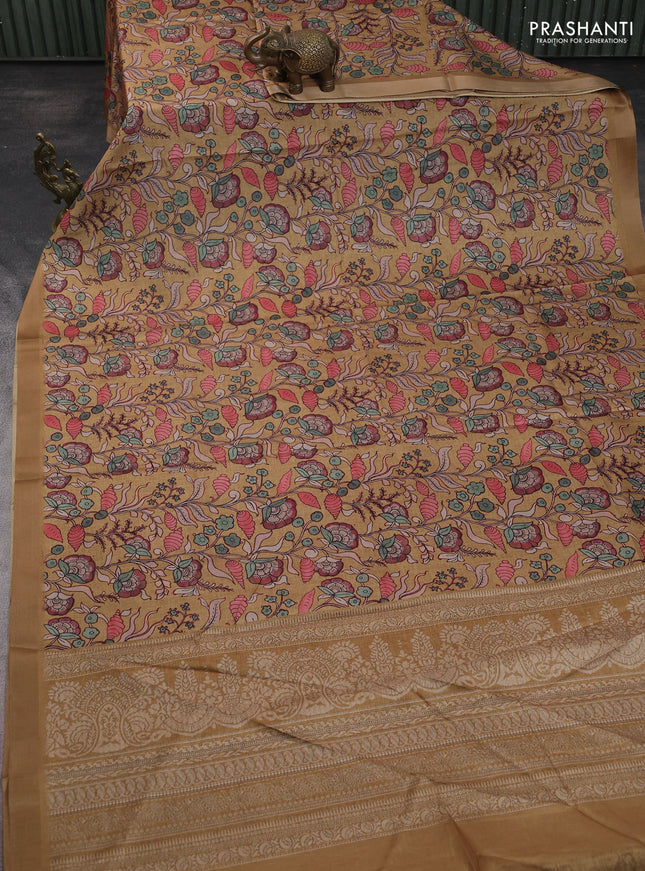 Semi tussar saree sandal with allover kalamkari prints and zari woven border