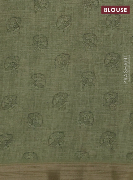 Semi tussar saree pastel green with allover kalamkari prints and zari woven border