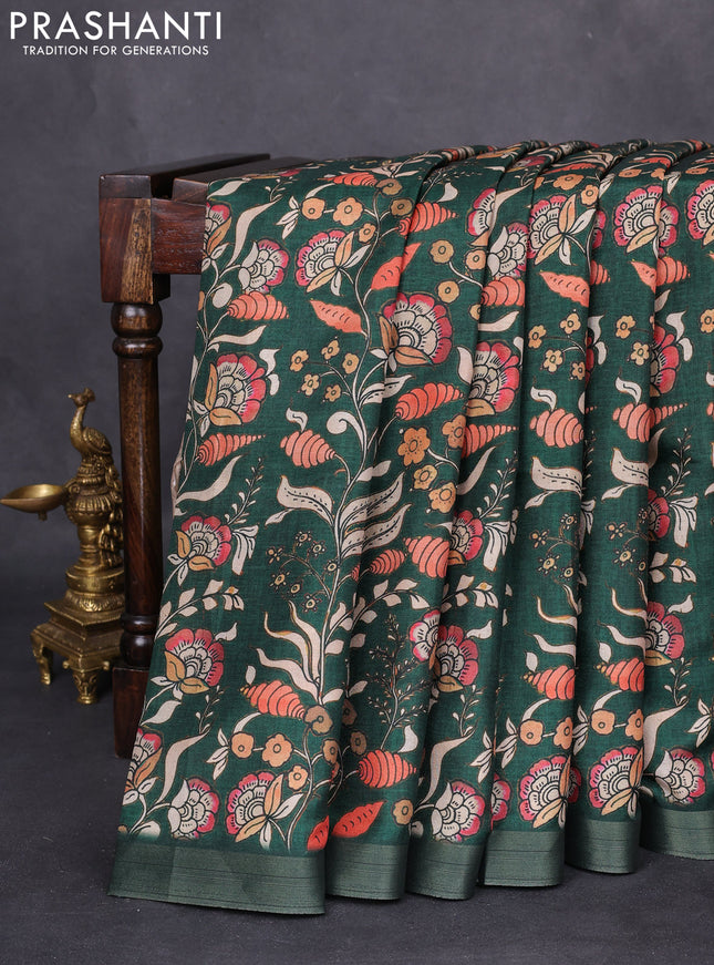 Semi tussar saree bottle green with allover kalamkari prints and zari woven border