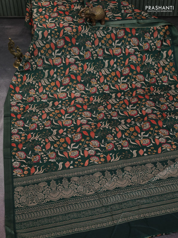 Semi tussar saree bottle green with allover kalamkari prints and zari woven border