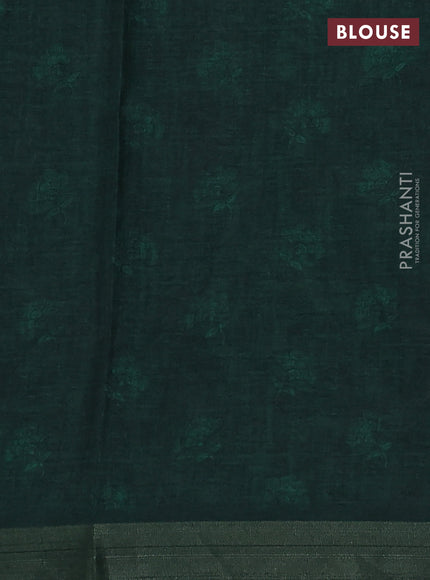 Semi tussar saree bottle green with allover kalamkari prints and zari woven border