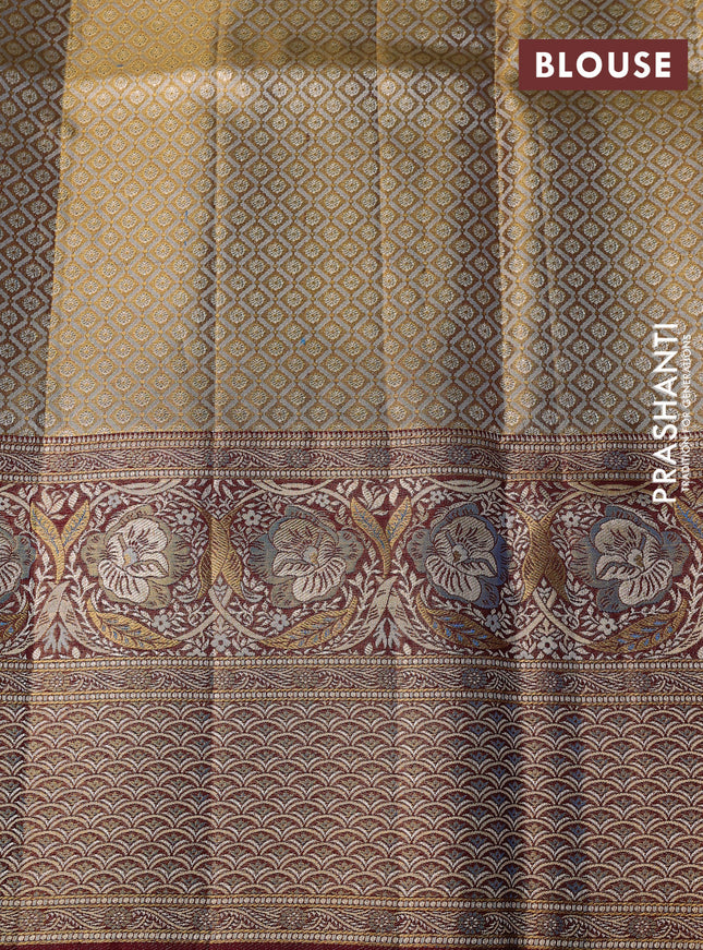 Pure Kanchipuram tissue silk saree dual shade of blue and deep maroon with allover zari woven brocade weaves and long zari woven mina border