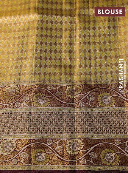 Pure Kanchipuram tissue silk saree lime yellow and brown with allover zari woven brocade weaves and long floral zari woven border