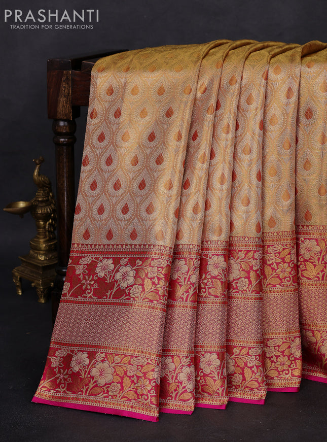 Pure Kanchipuram tissue silk saree dual shade of gold and pink with allover zari woven brocade weaves and long zari woven mina border