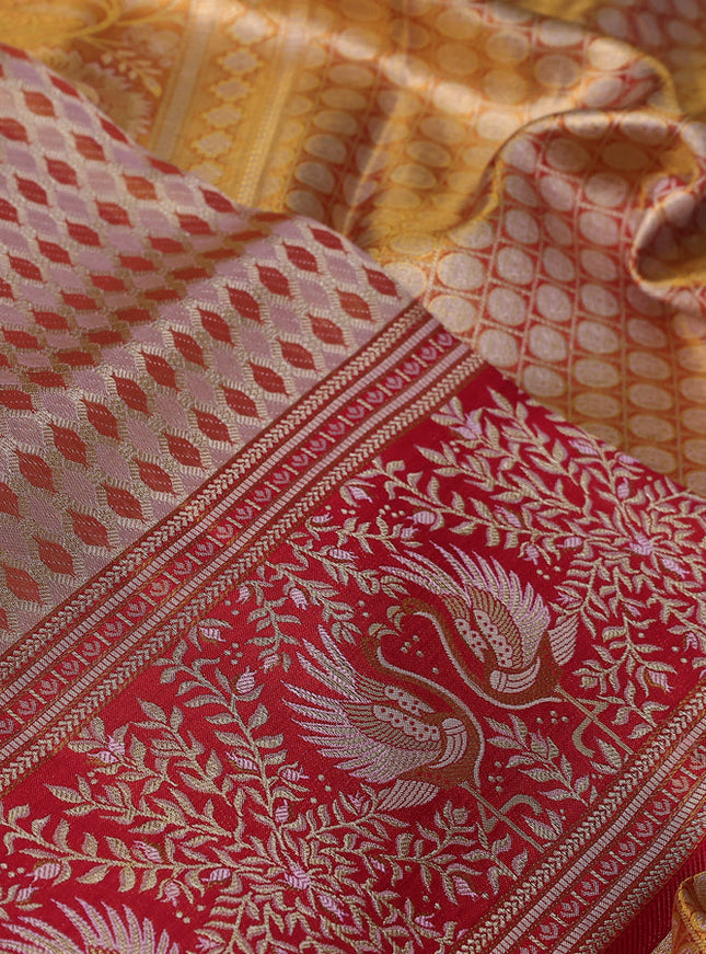 Pure Kanchipuram silk saree dual shade of pastel pink and maroon with allover zari woven brocade weaves and zari woven mina border