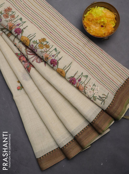 Tissue linen saree cream and green with embroided buttas and kantha stitch embroidery pallu