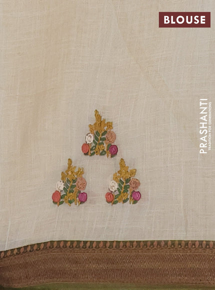 Tissue linen saree cream and green with embroided buttas and kantha stitch embroidery pallu