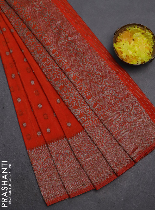 Banarasi semi crepe saree orange with woven buttas and woven border