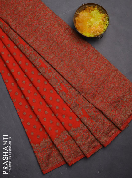 Banarasi semi crepe saree orange with woven buttas and woven border