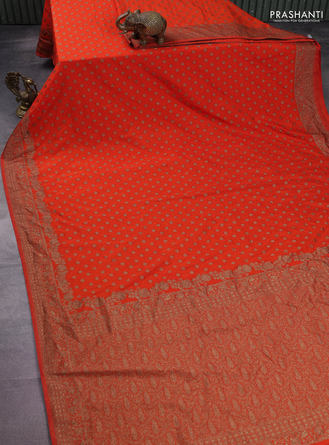 Banarasi semi crepe saree orange with woven buttas and woven border