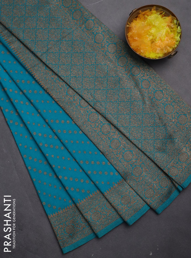 Banarasi semi crepe saree teal blue with allover woven buttas and woven border