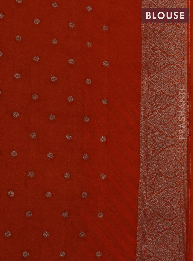 Banarasi semi crepe saree orange with allover stripes pattern and woven border