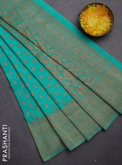 Banarasi semi crepe saree teal blue with woven buttas and woven border