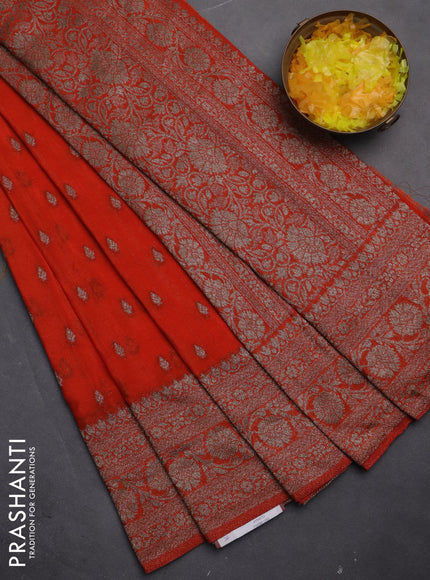Banarasi semi crepe saree orange with woven buttas and woven border