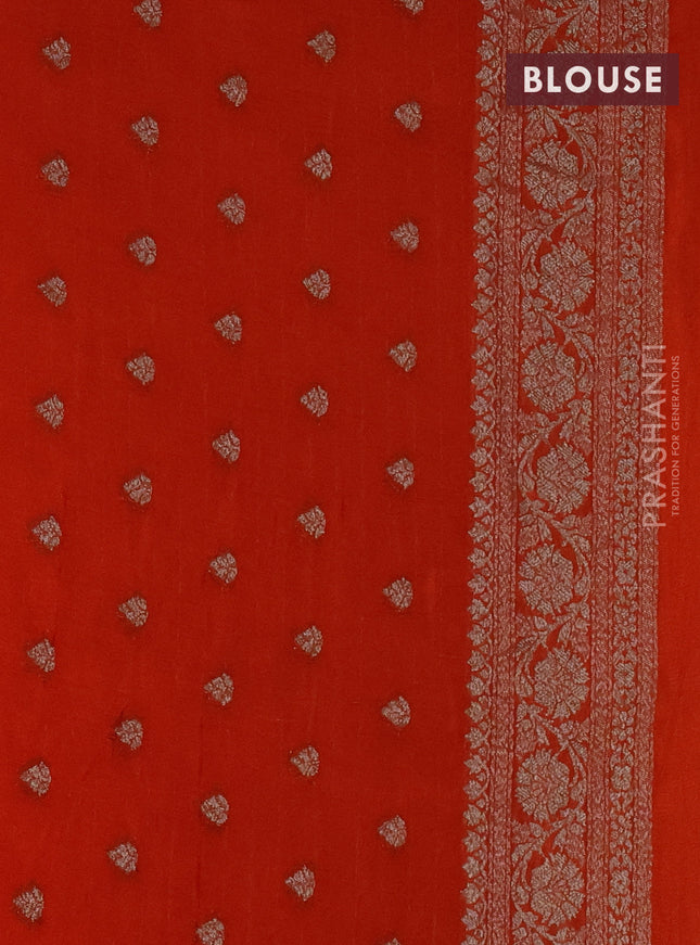 Banarasi semi crepe saree orange with woven buttas and woven border