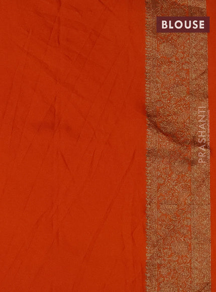 Banarasi semi crepe saree orange with woven buttas and woven border