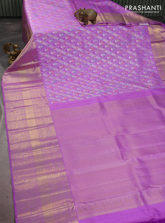 Pure kanchipuram silk saree lavender with allover silver zari woven brocade weaves and long zari woven border