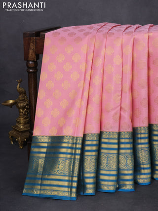Pure kanchipuram silk saree peach pink and peacock blue with zari woven buttas and zari woven korvai border