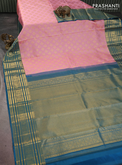 Pure kanchipuram silk saree peach pink and peacock blue with zari woven buttas and zari woven korvai border