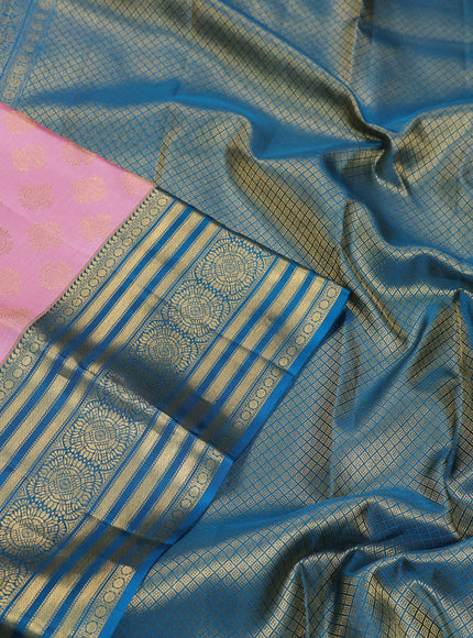 Pure kanchipuram silk saree peach pink and peacock blue with zari woven buttas and zari woven korvai border