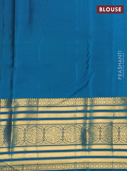 Pure kanchipuram silk saree peach pink and peacock blue with zari woven buttas and zari woven korvai border