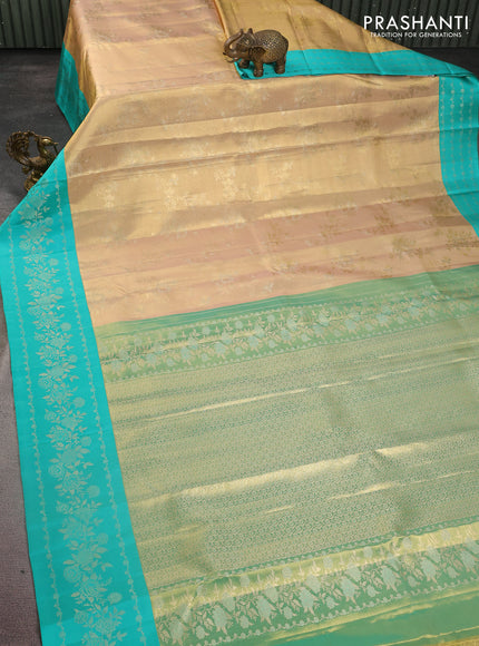 Pure kanchipuram Tissue silk saree gold and teal green with allover zari weaves and floral design zari border