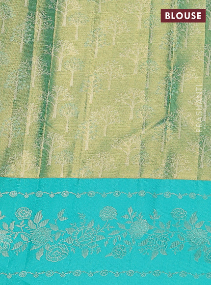 Pure kanchipuram Tissue silk saree gold and teal green with allover zari weaves and floral design zari border