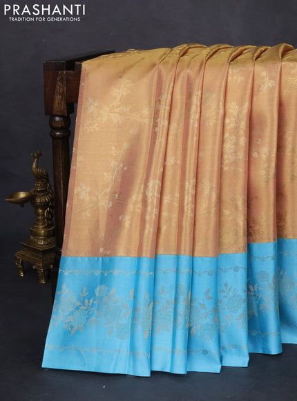 Pure kanchipuram Tissue silk saree gold and light blue with allover zari weaves and floral design zari border