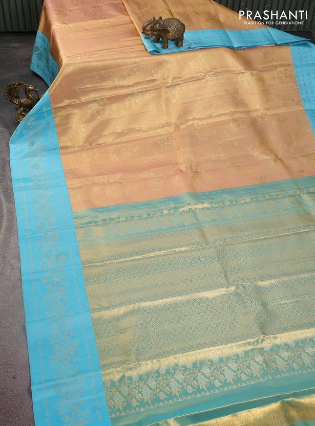 Pure kanchipuram Tissue silk saree gold and light blue with allover zari weaves and floral design zari border