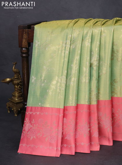 Pure kanchipuram Tissue silk saree pista green and peach shade with allover zari weaves and floral design zari border