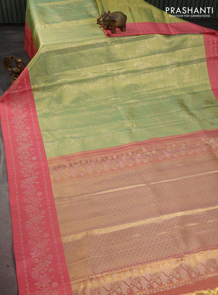 Pure kanchipuram Tissue silk saree pista green and peach shade with allover zari weaves and floral design zari border