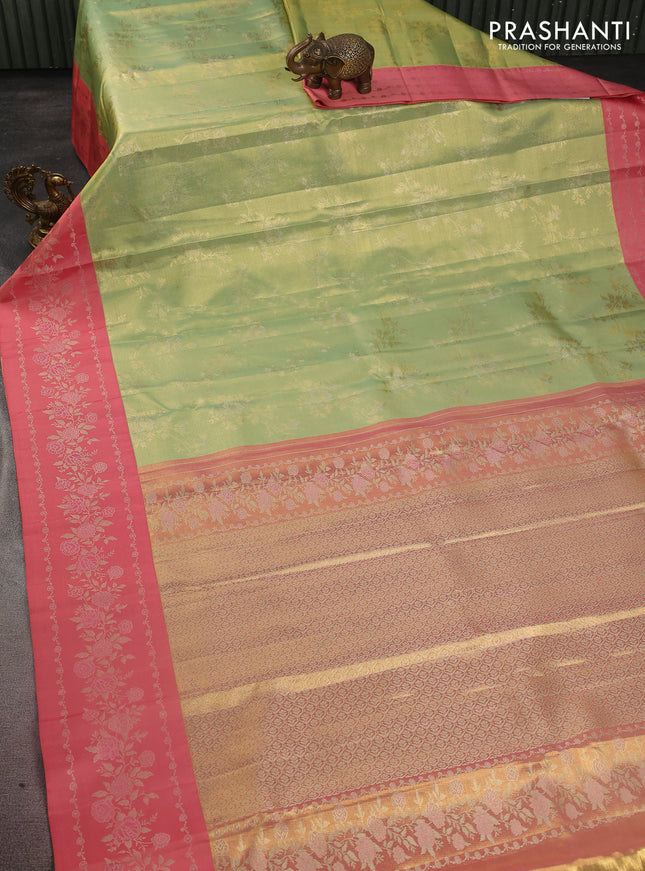 Pure kanchipuram Tissue silk saree pista green and peach shade with allover zari weaves and floral design zari border