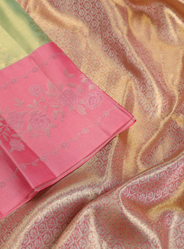 Pure kanchipuram Tissue silk saree pista green and peach shade with allover zari weaves and floral design zari border