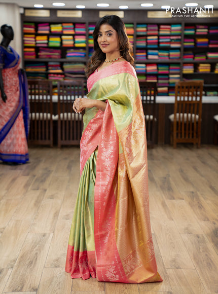 Pure kanchipuram Tissue silk saree pista green and peach shade with allover zari weaves and floral design zari border