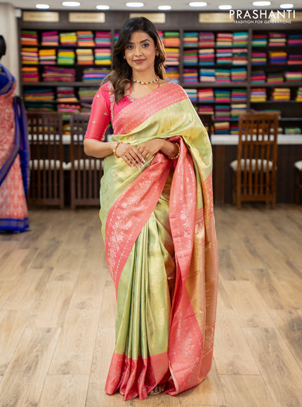 Pure kanchipuram Tissue silk saree pista green and peach shade with allover zari weaves and floral design zari border