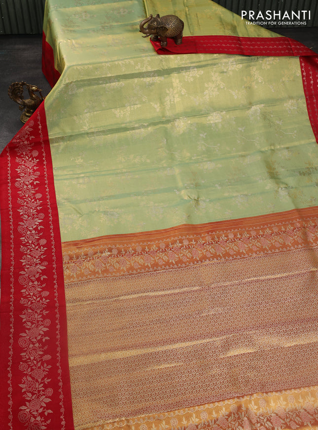 Pure kanchipuram Tissue silk saree pista green and red with allover zari weaves and floral design zari border
