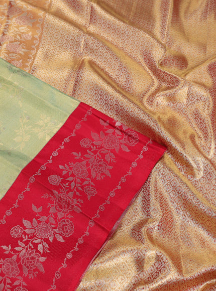 Pure kanchipuram Tissue silk saree pista green and red with allover zari weaves and floral design zari border