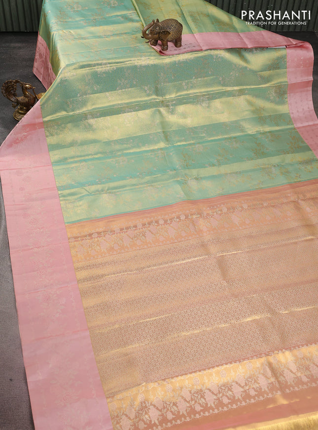 Pure kanchipuram Tissue silk saree teal green and peach shade with allover zari weaves and floral design zari border