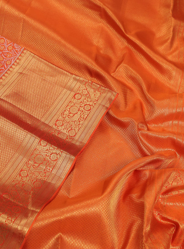 Pure kanchipuram silk saree orange with allover zari woven brocade weaves and long zari woven border