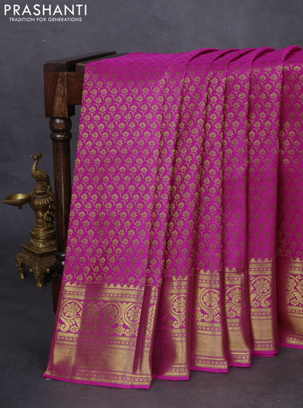 Pure kanchipuram silk saree magenta pink with allover zari woven brocade weaves and zari woven border