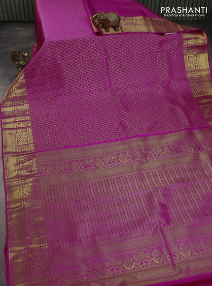 Pure kanchipuram silk saree magenta pink with allover zari woven brocade weaves and zari woven border