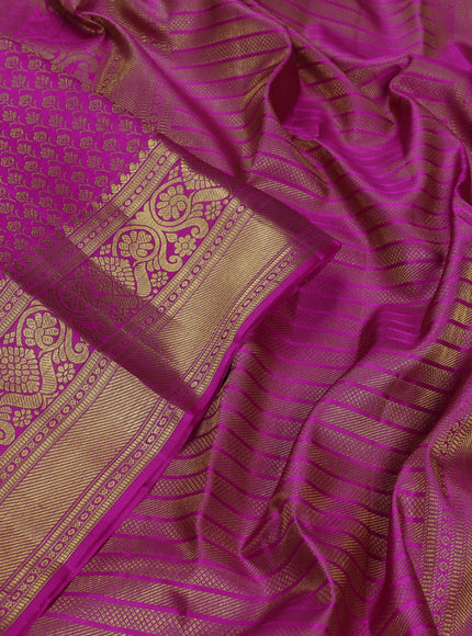 Pure kanchipuram silk saree magenta pink with allover zari woven brocade weaves and zari woven border