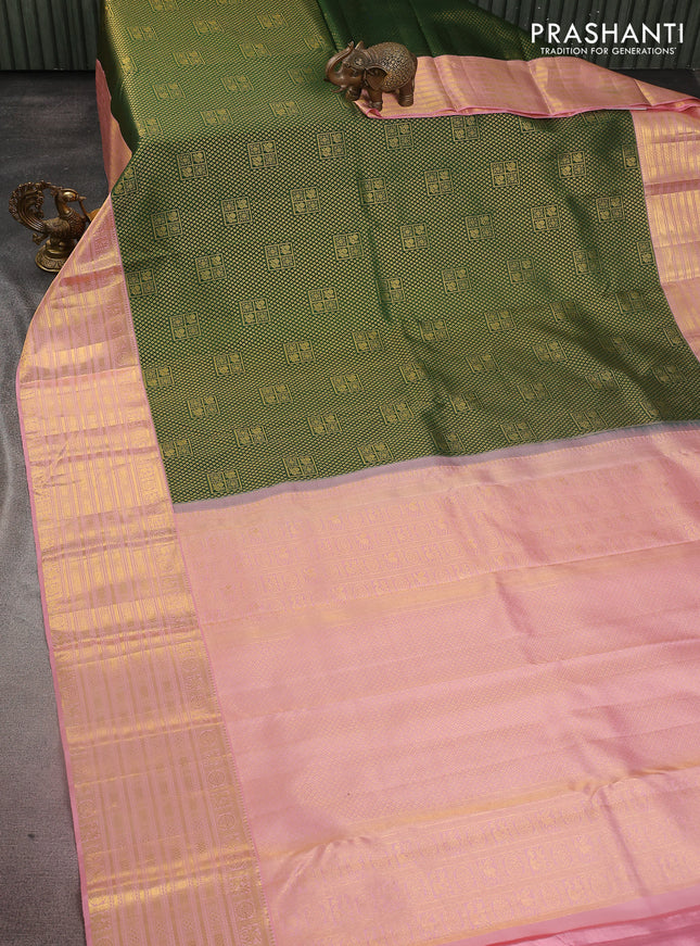 Pure kanchipuram silk saree green and peach pink with allover zari woven brocade weaves and zari woven border