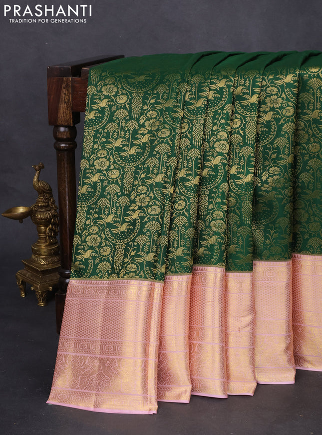 Pure kanchipuram silk saree green and peach pink with allover zari woven brocade weaves and zari woven border