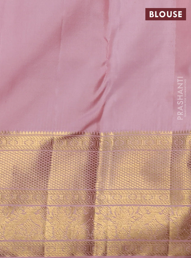 Pure kanchipuram silk saree green and peach pink with allover zari woven brocade weaves and zari woven border
