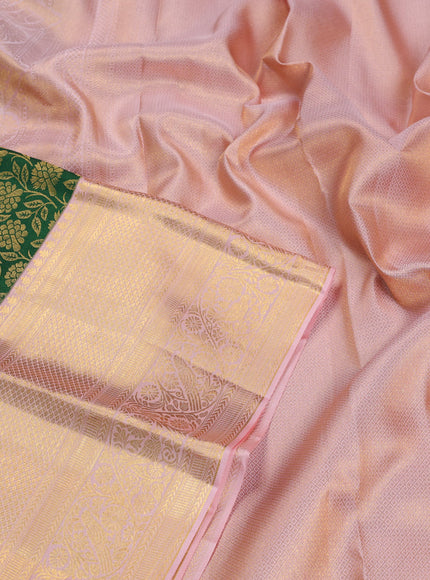 Pure kanchipuram silk saree green and peach shade with allover zari woven brocade weaves and zari woven border