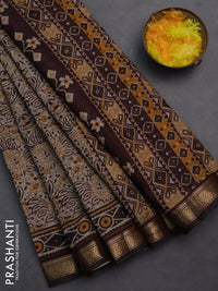Semi maheshwari cotton saree beige and coffee brown with allover prints and zari woven border