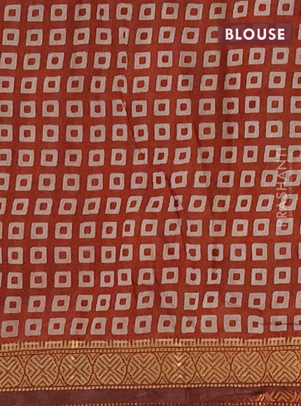 Semi maheshwari cotton saree sandal and maroon with allover floral prints and zari woven border