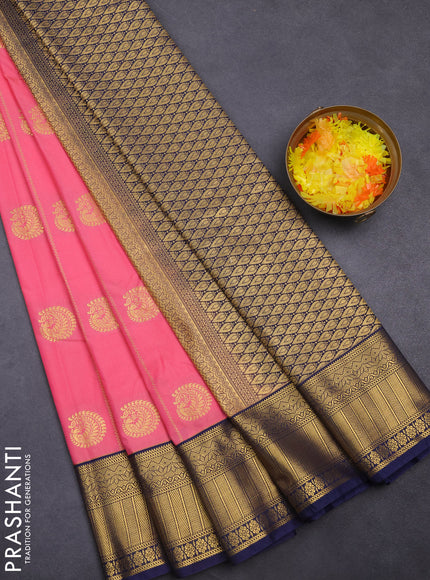 Semi kanchipuram silk saree peach pink and navy blue with allover zari weaves & buttas and zari woven korvai border
